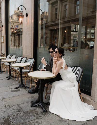 japanese couple at french café terrasse