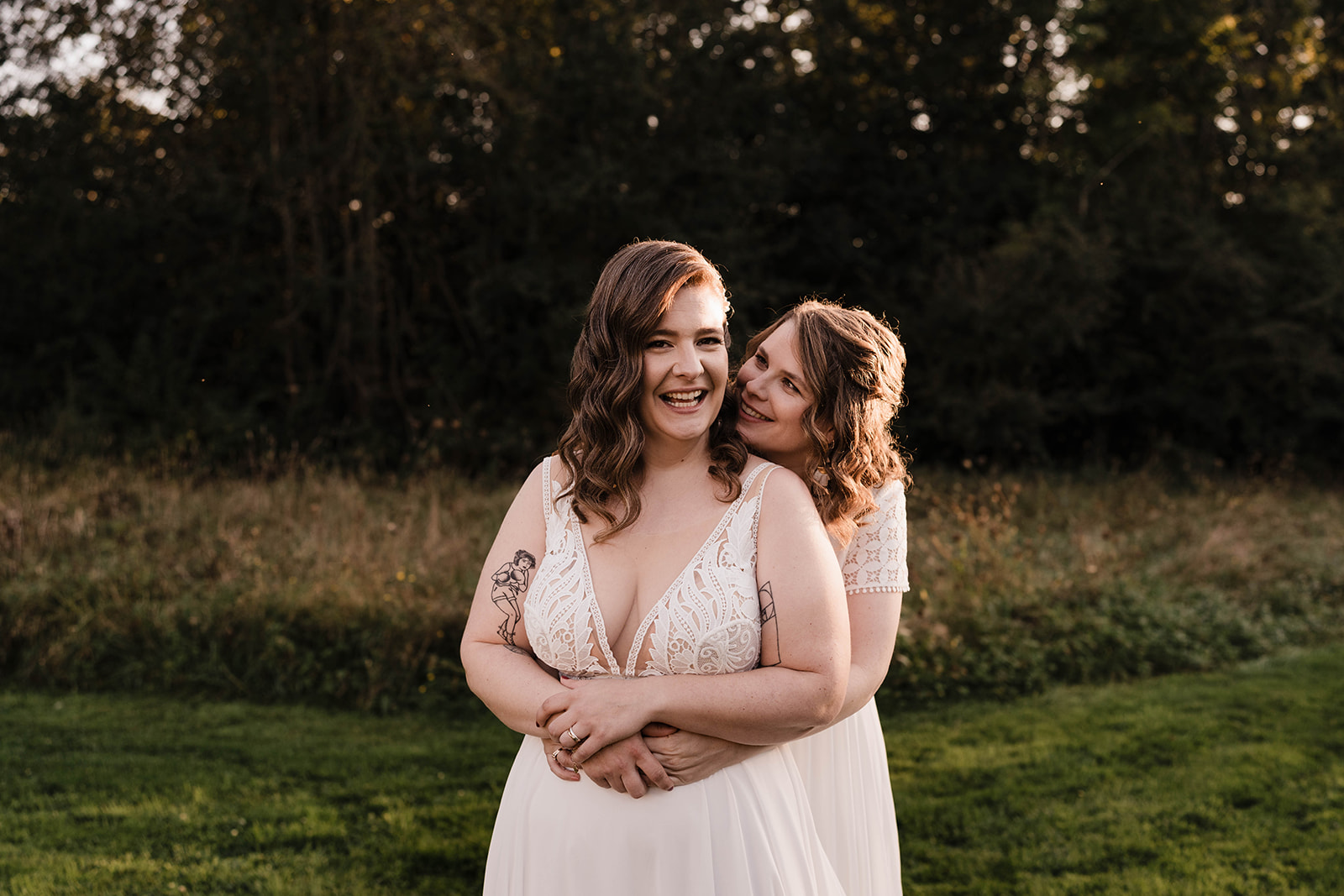two brides at sunset